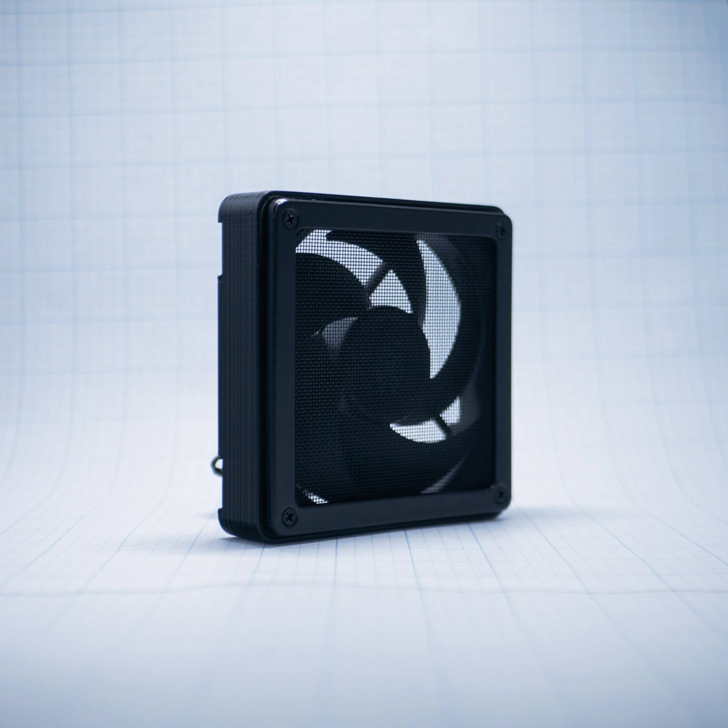 Black with black mesh 120mm Fan Shroud Filter & Outer Cover with an angled front view against white background with grid pattern. 