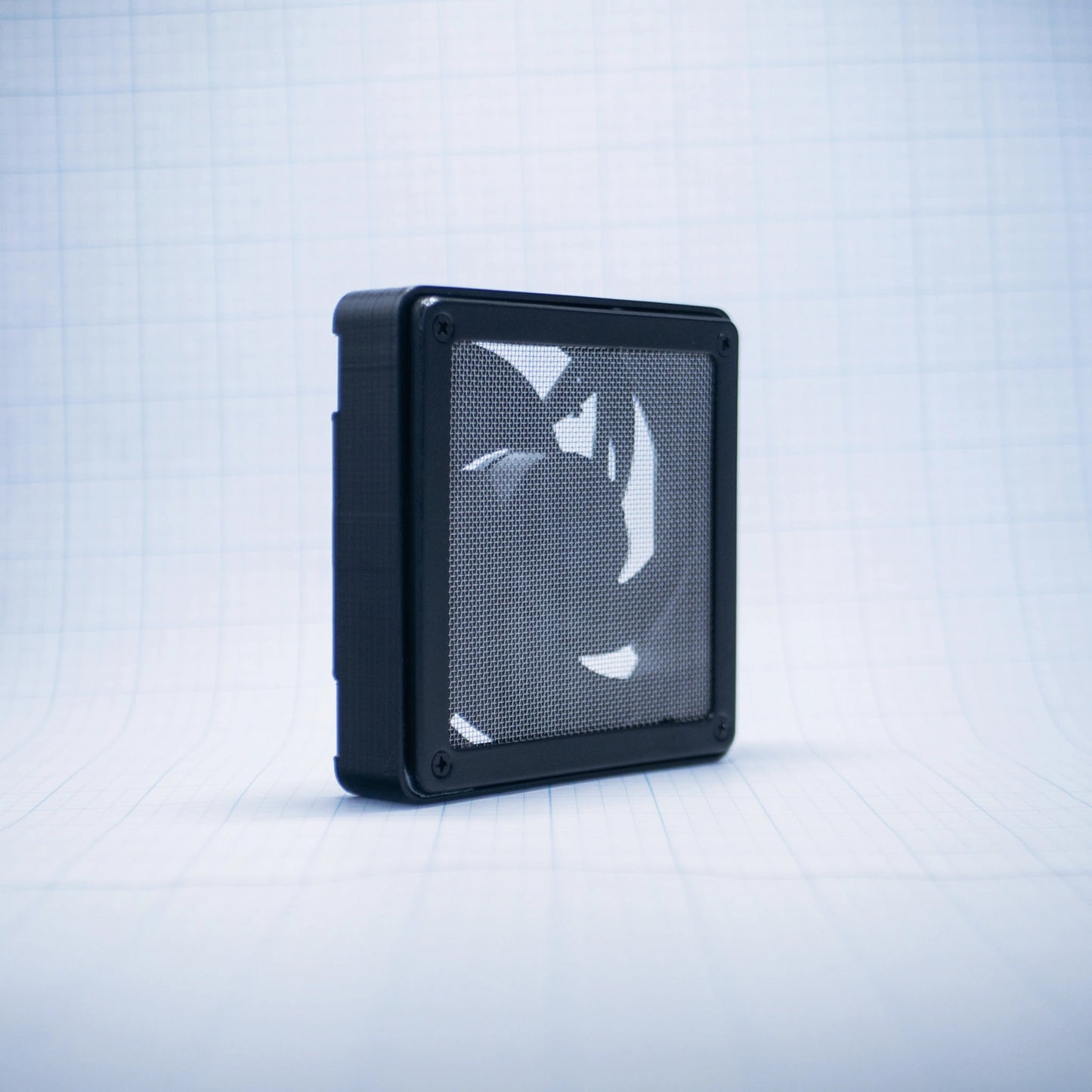 Black with raw steel mesh 120mm Fan Shroud Filter & Outer Cover with an angled front view against white background with grid pattern. 