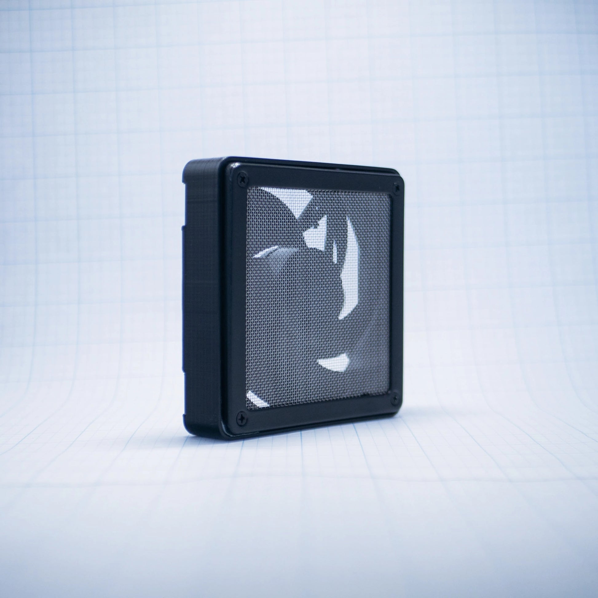 Black with raw steel mesh 120mm Fan Shroud Filter & Outer Cover with an angled front view against white background with grid pattern. 