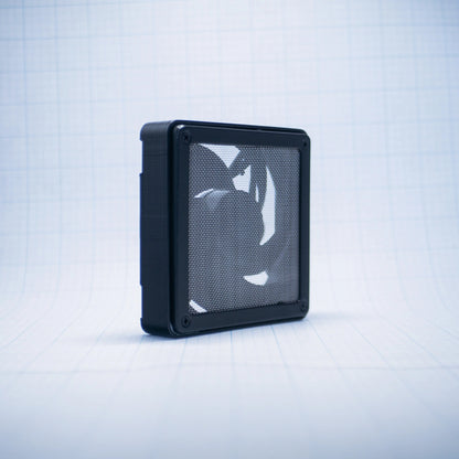 Black with raw steel mesh 120mm Fan Shroud Filter & Outer Cover with an angled front view against white background with grid pattern. 