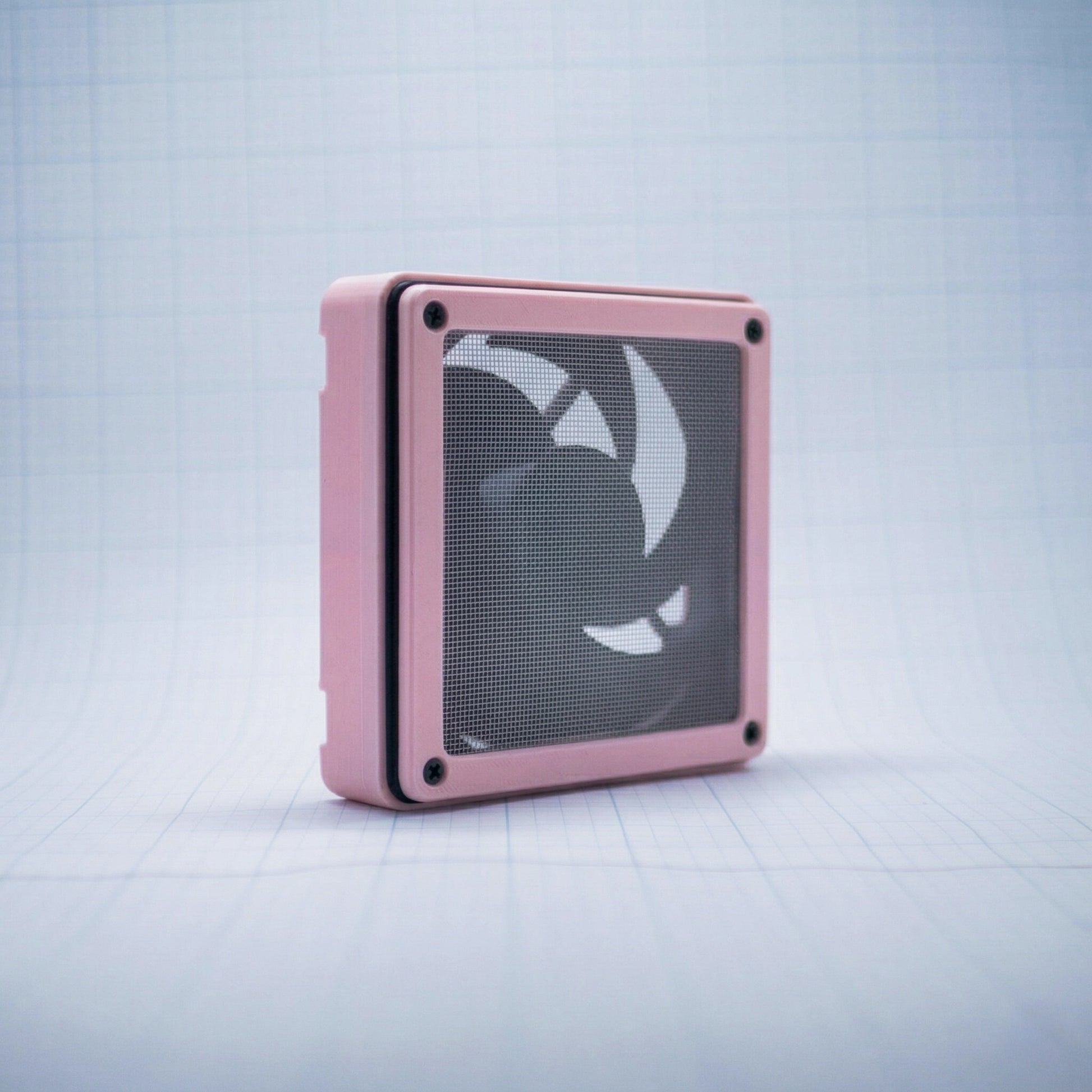 Pastel Pink with Pastel Pink 120mm Fan Shroud Filter & Outer Cover with an angled front view against white background with grid pattern. 