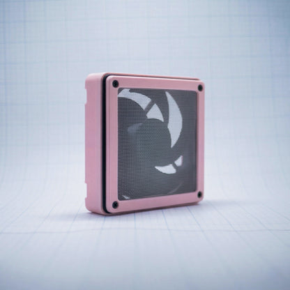 Pastel Pink with Pastel Pink 120mm Fan Shroud Filter & Outer Cover with an angled front view against white background with grid pattern. 